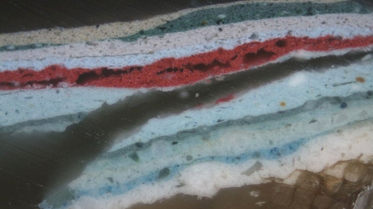 13 layers of paint over a wood substrate observed under the microscope in a paint sample from Cliveden